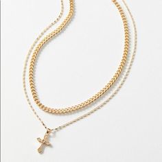 Brand New With Tags Product Sku: 49825839 ; Color Code: 070 Classic Cross Necklace Paired With A Chunky Curb Chain. Includes 2 Necklaces In Goldtone Finish, Set With Lobster Clasp Closures And Adjustable Extenders. Content + Care - Includes 2 Necklaces - Brass, Steel, Zinc - Wipe Clean - Imported Size - Length: 15.5”-17.5” - Width: 0.2”-0.6” Gold Necklace From Urban Outfitters As A Gift, Urban Outfitters Gold Necklace As A Gift, Urban Outfitters Gold Jewelry For Gift, Urban Outfitters Gold Jewelry For Gifts, Elegant Gold Jewelry From Urban Outfitters, Elegant Gold Urban Outfitters Jewelry, Necklace Set Gold, Urban Outfitters Jewelry, Layered Necklace Set