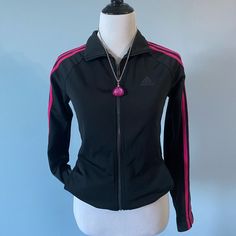 Pink And Black Adidas Jacket! A Black Jacket With Three Pink Stripes Down The Shoulders And Sleeves. You Can Wear Collar Either Way (See Photos). Nwt Size Xs. Measurements (Laying Flat): Shoulder To Hem: About 24 Inches Pit To Pit: About 17 Inches Offer :) Adidas Fitted Long Sleeve Outerwear, Fitted Long Sleeve Adidas Outerwear, Pink Fitted Track Jacket For Sports, Fitted Pink Track Jacket For Sports, Fitted Adidas Winter Track Jacket, Fitted Adidas Track Jacket For Winter, Pink Adidas Sports Outerwear, Pink Fitted Track Jacket For Fall, Fitted Pink Track Jacket For Fall