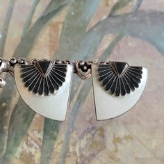 This is a vintage, sterling silver and black and white, enamel, post, earrings for pierced ears. They have tested positive for sterling. There are a few spots/marks and a chip on the enamel, as you can see in the images. All sales are final. These measure 22 mm x 24 mm. If you have a wish list or are looking for something specific, please ask. I may have exactly what you are looking for. As always please convo me with any questions or concerns regarding this item or with any international shipping questions. Unfortunately I do not accept returns or grant refunds. All shipping fees include handling fees. If you would like to combine shipping costs for more than one item, I would be happy to do so if you convo me before purchase. Purchasing my item means you have read, understood and will ab Wish List, White Enamel, Pierced Ears, Vintage Sterling Silver, Ear Piercings, Post Earrings, Jewelry Earrings Dangle, Give It To Me, Dangle Earrings