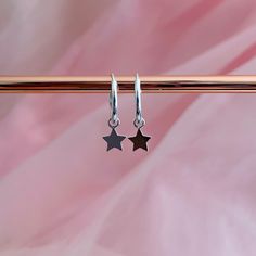 "Silver mini star charm hoop earrings | Gold star hoops | Rose gold mini hoops | Tiny hoop earrings. Simple and casual everyday mini hoop earrings with star dangle charm. The tiny charm is removable, that means that you can wear it by itself or exchange with another charm. These sets of mini hoops are the perfect jewelry to\" Mom and Me\" matching jewelry. Metal: 925 Sterling silver. ( 925 stamped ) Weight: 0,60g. Measurements: 6mm x 6mm. Finishing: Silver, 18k Gold or Rose gold. All of them wit Rose Gold Hoop Earrings, Hoop Earrings Silver, Tiny Hoop Earrings, Tiny Charm, Small Hoop Earrings, Dangle Hoop Earrings, Hoop Earrings Gold, Mini Hoop Earrings, Jewelry Metal