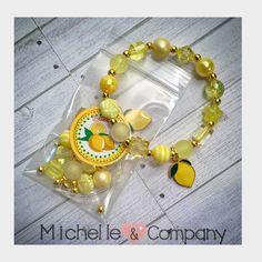 Please find instructions for using Stretch Magic in a video posted on my Facebook page http://www.facebook.com/michelleandcompany7 Lemon into Lemonade BOHO style DIY charm bracelet. Each kit includes a 12 inch length of stretchy cord (Stretch Magic), an assortment of 14 unique designer beads, gold tone spacers and a yellow enamel Lemon charm. The beads in the kit will make a 7 inch bracelet, if you remove one of the beads it makes a 6.5" bracelet. You will receive each bracelet kit packaged in a Slumber Party Activities, Diy Lemonade, Lemon Lemonade, Bracelet Kit, Diy Charm, Diy Charm Bracelet, Bracelet Kits, Slumber Party, Pajama Party