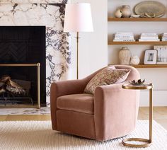 a living room filled with furniture and a fire place