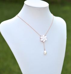 "2018 Collection, MORNING HEIRLOOM Y NECKLACE COLLECTION Featuring hand sculpted white Gardenia and tear drop pearl necklace. Details : - Gardenia made from baking polymer clay. -Flower size approx : 22-23mm - Flower glued on metal plated over brass filigree. - Entire length ; 16 inches + 2 \" extender. Finish with lobster clasp. - Chain finish available in silver plated, antiqued brass, gold and rose gold. - Sterling silver and gold filled chain available with additional cost, ( the filigree in Pearl White Flower Shaped Jewelry With Pearl Drop, Pearl Chain Jewelry With Flower Pendant, Elegant White Flower Necklace With Adjustable Chain, White Flower Pendant Jewelry With Adjustable Chain, Delicate White Adjustable Drop Necklace, Delicate Adjustable White Drop Necklace, White Flower Pendant Necklace With Pearl Drop, White Pearl Drop Flower Pendant Necklace, White Flower-shaped Pearl Necklace With Pendant