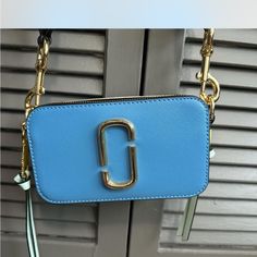 Never Used, Still Has The Stuffing! Luxury Blue Shoulder Bag With Phone Holder, Luxury Blue Shoulder Bag With Mobile Phone Bag, Blue Rectangular Shoulder Bag With Branded Hardware, Blue Crossbody Shoulder Bag With Branded Hardware, Blue Crossbody Bag With Gold-tone Hardware, Blue Crossbody Shoulder Bag With Gold-tone Hardware, Light Blue Crossbody Bag With Gold-tone Hardware, Gold Crossbody Bag, Bags Marc Jacobs