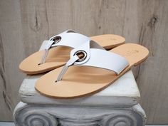 Men Flip flop Leather sandals, white Color, Gift For Men, Handmade Sparta High Quality Genuine Leather sandals, Handmade sandals, 100% High Quality Genuine Leather. Classic and stylish, handmade unisex sandals in a vast variety of colors, will complement your outfit for casual appeal.It characterize them the natural leather insole, leather outer sole and leather upper, making it the ideal sandal for hot summer days. You will feel your feet cool and restful all day and night. * Greek Stylish Men White Sandals With Adjustable Single Toe Strap, White Adjustable Sandals With Single Toe Strap, White Adjustable Leather Sandals, Adjustable White Leather Sandals, White Toe Loop Flip Flops For Summer, White Leather Toe Post Sandals, White Leather Beach Flip Flops, Adjustable White Slip-on Sandals, Casual White Leather Flip Flops