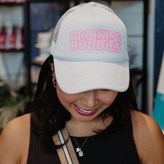 A best seller for us! This fun and festive hat is perfect for the girls' night out or bachelorette parties. Tell them to get one for you and your friend to match, or give it as a bachelorette party gift. Either way, this foam hat is sure to make a statement. So grab your girlfriends and let the good times flow with the Drinking Buddies Foam Hat. 65% cotton, 35% polyester machine wash delicate or hand wash one size fits most adjustable back mesh netting snapback closure Are you looking for wholes Bachelorette Party Adjustable Trucker Hat, Adjustable Trucker Cap For Bachelorette Party, Adjustable Trucker Hat For Bachelorette Party, Novelty Trucker Hat For Party, Adjustable White Mini Hats For Bachelorette Party, White Adjustable Hat For Bachelorette Party, Boat Hair, Lake Hair Styles, Camping Hair