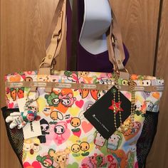 Nwt Tokidoki Lesportsac Mamma Mia L’amore. "Rare, Retired" Great Front Placement. Zipped Main Closure. Two Side Mesh Pockets For Easy Access Items; Inside Back Has Zipped Closure Pocket. Inside Front Pocket For Cell Phone. Inside Carabiner On Stretch Cord For Easy Access To Keys. Lightweight. 8.75 X 12.5 X 5.5. Limited Time Only Until 12/31/2018: Purchase This Bag And Get The Nwt Matching Wallet For 50% Off. What A "Steal"!!! Harajuku Style Travel Tote Satchel, Harajuku Tote Satchel For Everyday Use, Harajuku Style Tote Satchel For Everyday Use, Harajuku Style Tote Satchel For Travel, Red Harajuku Bags For Everyday Use, Red Harajuku Style Bags For Everyday Use, Harajuku Style Red Bags For Everyday Use, Red Harajuku Style Bag For Daily Use, Harajuku Style Red Bag For Daily Use