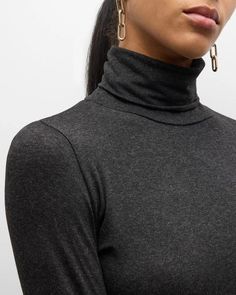 This Soft Touch Long-Sleeve Turtleneck from Majestic Filatures is the perfect mix of coziness and style. Crafted from a viscose-wrapped elastane that delivers four-way stretch and antimicrobial comfort, this top hugs your curves for an on-trend look. The turtleneck and long sleeves keep you warm while staying breathable. Wear it for lounging or pair it with your favorite jeans for an effortlessly cool Instagram selfie. Best of all, the anti-pill fabric means it stays just as soft after many wash Fitted Turtleneck Long Sleeve Top For Work, Funnel Neck Elastane Top For Winter, Fitted Mock Neck Top In Elastane For Fall, Fitted Funnel Neck Top For Work, Winter Funnel Neck Tops In Elastane, Winter Funnel Neck Elastane Tops, High Neck Elastane Tops For Fall, Fitted Foldover Long Sleeve Top For Fall, Fitted Long Sleeve Foldover Top For Fall