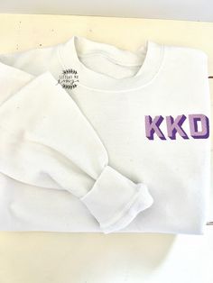 "This Kids monogrammed sweatshirt is perfect all season long for those cold days!  These are unisex sweatshirts and pricing includes the cover/stitch backing. Sizing runs true to size.  YS is 5/6, YM is 7/8, YL is 8/10, toddler and adult sizes available too.  Youth & Toddler sweatshirt colors Navy, White, Hot Pink, Pink, Baby Blue, Black, Purple, Red, Orange, Grey, Hunter Green (message me for other colors not listed) Listing includes embroidery personalization up to 3 characters and will be the Monogram Hoodie Ideas, Kids Embroidered Sweatshirt, Personalized Cotton Sweatshirt For Winter, Personalized Relaxed Fit Winter Sweatshirt, Cotton Monogram Sweatshirt, Cotton Monogram Long Sleeve Sweatshirt, Personalized Crew Neck Sweatshirt For Fall, Personalized Cotton Sweatshirt For Fall, Winter Monogram Long Sleeve Sweatshirt