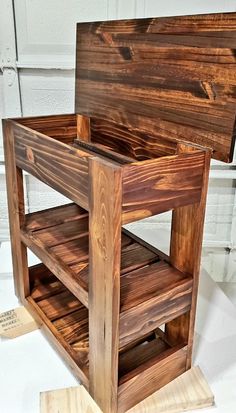 a wooden box sitting on top of a table