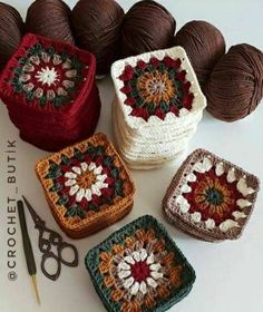 four crocheted grannys are sitting next to each other