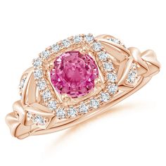 The compelling beauty of vines and leaves is brought to life with this surreal 14k rose gold pink sapphire ring. Floating amid a scintillating diamond halo, the prong-set round pink sapphire looks simply stunning. The leaf motifs on the shoulders are also encrusted with pavé-set diamonds for added brilliance. Pink Sapphire Jewelry, Sapphire Halo Ring, Pink Sapphire Pendant, Pink Sapphire Earrings, Timeless Ring, Pink Sapphire Ring, Rose Gold Pink, Sapphire Earrings, Pink Ring