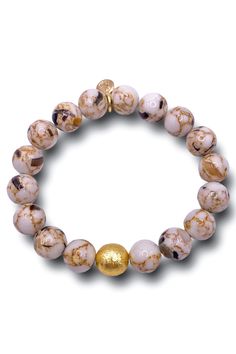 Marble exudes timeless elegance with its smooth, polished finish. Our Marble bracelet is a classic brushed gold bead finishes the bracelet making it softly sparkle on your wrist and adds a subtle pop of color to any outfit. Gold brushed bead Gold BuDhaGirl logo charm at end 7 1/4 inches bracelet length Slip-on style One size fits most - slightly elastic Designed and handcrafted in the USA Each Sold Separately Modern White Bracelets With Round Beads, Modern White Round Beads Bracelets, Modern White Round Bead Bracelets, Modern White Round Beaded Bracelets, Elegant Bracelets With 8mm Beads As A Gift, Modern Yellow Gold Bracelets With Round Beads, Elegant Adjustable Pearl Bracelet With Faceted Beads, Adjustable Gold Pearl Bracelet In Modern Style, Elegant Beaded Bracelets With Faceted Beads