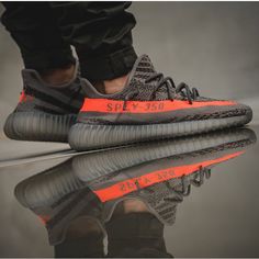 The Adidas Yeezy Boost 350 V2 Beluga Features A New Primeknit Upper That Combines Three Hues Of Yarn: Solar Red, Steeple Grey, And Beluga. A New Solar Red Stripe Is Seen On This Revamped Version Of The Yeezy 350 That Reads “Sply-350” On It Along With More Solar Red Speckling Throughout. Finishing Things Off Is A Semi Translucent Yeezy Boost Midsole. Adidas Yeezy 350 V2, Mens Yeezy, Adidas Yeezy 350, Curvy Petite Fashion, Yeezy Boost 350 V2, Yeezy 350, Yeezy Shoes, Victorias Secret Models, Milan Fashion Weeks