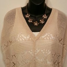 Beige Crochet Top Elegant crochet top NWT. Fringe on the bottom. Layer over whichever color you choose. The tag says medium but fits like a large. 100% acrylic.   Bundle for a 15% Discount   Thank you for shopping! t/o Tops Elegant Spring Crochet Top For Layering, Elegant Crochet Top For Spring Layering, Elegant Crochet Top For Layering, Elegant Beige Crochet Top With Pointelle Knit, Elegant Cream Open Knit Crochet Top, Elegant Crochet Top With Open Knit V-neck, Beige V-neck Top For Beach, Elegant V-neck Open Knit Crochet Top, Elegant Beige V-neck Crochet Top