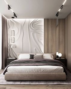 a large bed sitting in the middle of a bedroom next to a wall mounted light