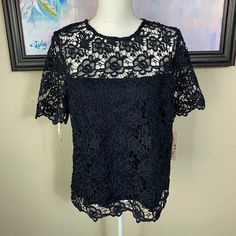 Nwt Nanette Lepore Dark Navy Blouse, Size L Beautiful Dark Navy Blouse With High Neckline And Gold Zipper Please See Photos For Measurements Short Sleeve Lace Top For Spring Formal, Formal Short Sleeve Lace Top For Spring, Short Sleeve Lace Tops For Work, Lace Short Sleeve Tops For Work, Formal Short Sleeve Lace Top, Lace Tops For Summer Workwear, Fitted Short Sleeve Lace Top For Work, Elegant Sheer Lace Top With Short Sleeves, Elegant Sheer Short Sleeve Lace Top