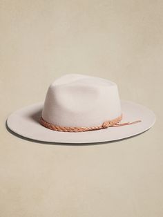 Handcrafted from 200-gram Argentine wool felt, this Hampui hat conjures up memories of markets in Marrakesh with it's braided leather trim.  HAMPUI: Rugged, yet always-refined, adventuresome Hampui hats are handcrafted from beautiful, sustainable materials that showcase the magic of the natural world.  Brim Width: 3. 25" Crown Height: 5" Small: 21. 7" (55cm) Medium: 22. 4" (57cm) Large: 23. 2" (59cm) X-Large: 24" (61cm) Holiday Family Outfits, Western Hats, Matching Family Outfits, Family Outfits, Braided Leather, Sustainable Materials, Western Cowboy, The Conjuring, Leather Trim