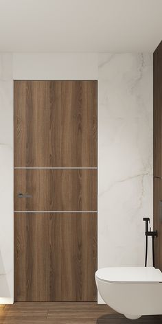 a bathroom with a tub, sink and wooden door