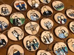 wooden ornament with pictures of people on them