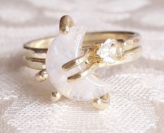 "This gorgeous moon and star ring set is the perfect gift for the boho-hippie spirit! The luminous moonstone is carved in a smoothly curving crescent. The tiny glittering Herkimer diamond quartz crystal is set horizontally, positioned to sit perfectly in the inner curve of the moonstone. Both gems are set in claw settings made in your choice of bright or oxidized sterling silver, rose gold fill, or yellow gold fill. The bands have a hammered texture, giving the metal a silky finish that beautifu Celestial Rings, Crescent Moon And Star, Herkimer Diamond Ring, Stackable Diamond Rings, Celestial Ring, Raw Crystal Ring, Moon And Star Ring, Stacking Ring Set, Diamond Quartz