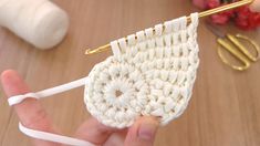 the crochet purse is being worked on