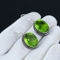 Peridot Earring, 925 Sterling Silver Earring, Handmade Earring, Antique Earring, Peridot Gemstone, Gifts For Mother, Peridot Jewelry For Her ❏ Product Information ● Gemstone Type - Peridot ( Lab MADE ) ● Pendant Size - 5 Cm. ● Metal Type - 925 Sterling Silver With 925 Stamped ● Free Silver Chain With This Pendant * Benefits Of Wearing Peridot  Peridot stone brings good health, restful sleep and immense peace and serenity in relationships. This powerful green colored gemstone balances the emotion Lime Green Earrings For Gift, Green Sterling Silver Crystal Earrings, Oval Peridot Earrings For Gift, Lime Green Jewelry With Matching Earrings For Gift, Handmade Peridot Round Earrings, Peridot Gemstone Earrings, Peridot Gemstone Round Earrings, Round Peridot Gemstone Earrings, Handmade Round Peridot Earrings