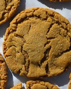 several cookies are arranged together on a table