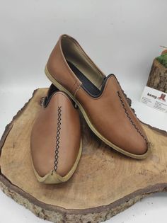 These are genuine leather, handmade men's shoes. Very useful soft shoes. Made with naturel leather and naturel dyed. There are many diffirent color options.   Our processing time 2-10 bussines days, But must of time we are shipping your order very earlier. ( express shipping, Fedex, Ups, Dhl, Tnt ) Every size is available, 5 us men's to 13.5 us men's, 37 eu men's to 50 eu men's. Men's shoes are %100 naturel. ALL ABOUT TURKISH YEMENI SHOES Put away those rubber flip flops.  The only shoes you nee Traditional Brown Moccasins With Round Toe, Traditional Brown Leather Slip-on Shoes, Traditional Leather Loafers, Traditional Moccasins With Stitched Sole, Traditional Plain Toe Leather Shoes, Artisan Brown Leather Shoes, Brown Artisan Leather Shoes, Traditional Brown Leather Shoes With Rubber Sole, Traditional Brown Leather Shoes With Stitched Sole