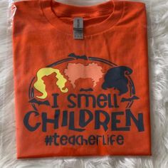 “I Smell Children” Halloween T Shirt Nwt Education Shirt Halloween Teacher Outfit Ideas, Halloween Cotton T-shirt With Text Print, Halloween Cotton T-shirt With Letter Print, Halloween Themed Cotton Tops, Halloween Letter Print Cotton T-shirt, Cotton Halloween Themed Tops, Themed Cotton Tops For Halloween, Fall Cotton T-shirt With Character Print, Themed Pre-shrunk Cotton T-shirt