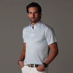 Oxford Button Down Collar Polo Light Blue – Collars & Co. Fitted Light Blue Short Sleeve Polo Shirt, Fitted Light Blue Polo Shirt With Polo Collar, Light Blue Fitted Polo Shirt With Polo Collar, Fitted Light Blue Polo Shirt, Classic Short Sleeve Golf Shirt, Fitted Short Sleeve Golf Shirt, Classic Fitted Golf Shirt, Elegant Short Sleeve Polo Shirt For Formal Occasions, Elegant Short Sleeve Polo Shirt For Business