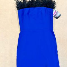 Nwt Amanda Uprichard Strapless, Bright Blue Mini Dress With A Feather Trim Along The Top, Giving It A High-Fashion, Party-Ready Look. The Feathers Add An Eye-Catching And Elegant Detail, Making It Perfect For Events Where You Want To Stand Out. Amanda Uprichard Dress, Royal Blue Dress, Amanda Uprichard, Feather Trim, Blue Mini Dress, Black Feathers, Bright Blue, Blue Dress, Black Blue