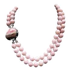 A.Jeschel Pink Onyx with a signature Rhodocrosite clasp necklace. | From a unique collection of vintage Beaded Necklaces at https://www.1stdibs.com/jewelry/necklaces/beaded-necklaces/. Necklaces Beaded, Emotional Stability, Artisan Bracelets, Vintage Beads Necklace, Clasp Necklace, A Signature, Difficult Times, Queen Mary, Pink Beads