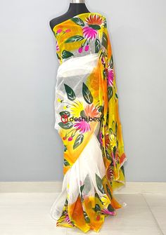 This Hand Painted Mixed Cotton Saree is perfect for your everyday and occasional use. Mixed Cotton Saree. All Over Floral Hand Painted Work. No Blouse Piece. Color: There might be slight color variation due to lighting and flashes while the photo shooting. The color may also vary because of different screen resolutions. Wash Care: Wash with cold water. White Floral Print Blouse Piece For Festivals, White Floral Print Saree For Festivals, Green Floral Print Saree For Summer, Summer Green Floral Print Saree, Multicolor Summer Saree With Unstitched Blouse, Summer Multicolor Saree With Unstitched Blouse, Multicolor Saree With Unstitched Blouse For Summer, Spring Green Saree With Floral Print, White Summer Saree With Unstitched Blouse