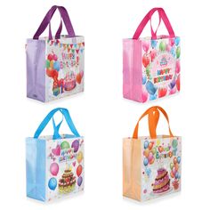 three birthday bags with balloons, cake and candles on them are shown in four different colors