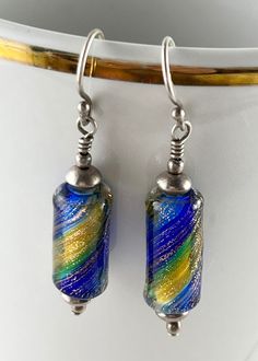 Lamp work swirl in blue and yellow.  These beads have a sparkle to them inside. Light weight.  Tests as sterling. Unique Blue Spiral-shaped Jewelry, Nickel-free Spiral Blue Earrings, Blue Dangle Earrings Cadmium-free, Sterling Silver Jewelry With Colorful Beads, Blue Spiral Sterling Silver Jewelry, Treble Clef Necklace, Pinterest Diy Crafts, Pinterest Diy, Vintage Nautical