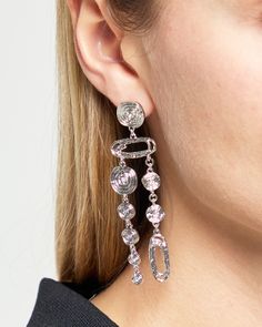 Product Details Add a unique touch to your jewelry collection with our Circular Chain Drop Earrings. These abstract and dangly earrings are the perfect statement piece for any outfit. With a stud closure, they are both stylish and secure. - Push back drop earrings- Material: Silver Style# F24JEWZ041 Fit Notes - Product measures approximately 8 cm Due to the nature of this product, all sales are final. We will replace broken items when possible or offer a replacement for items damaged during shipping. Returns, refunds, or replacement products for reasons other than damage incurred during shipping cannot be accepted. Modern Metal Clip-on Jewelry, Trendy Silver Clip-on Jewelry, Elegant Silver Clip-on Earrings For Fashion, Modern Clip-on Drop Earrings, Modern Sterling Silver Jewelry With Dangling Charms, Dangle Linear Earrings With Plating For Party, Modern Metal Earrings For Party, Trendy Metal Linear Earrings For Parties, Modern Party Earrings With Plating