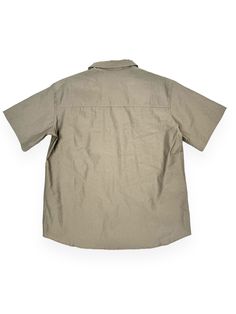 The Open Collar Shortsleeve Shirt in Khaki Beige from KAPPY, South Korea Details Product featuring unique pocket detail on the front One size fits most! Oversized, carefree and awesome Casual Button-up Camp Shirt With Pockets, Utility Cotton Top With Cargo Pockets, Cotton Tops With Cargo Pockets For Outdoor, Outdoor Cotton Tops With Flap Pockets, Cotton Tops With Flap Pockets For Outdoor, Collared Outdoor Tops With Side Pockets, Casual Collared Shirt With Cargo Pockets, Collared Tops With Side Pockets For Outdoor, Khaki Short Sleeve Shirt For Summer Outdoor