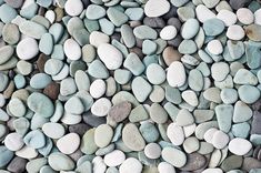 many different colored rocks are arranged together