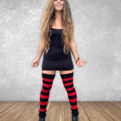 Gothic meets grunge in these killer red & black striped thigh-high leg warmers! Made from soft, warm Merino wool, these 3ft hand-knit leg warmers rise comfortably over the knee, giving you that effortlessly cool, "cooler than Hot Topic" vibe while embracing festive autumnal tones. Perfect for layering with skirts, shorts, or tights, they add a bold, edgy twist to your fall & winter wardrobe. Red and black together? It's a timeless combo -- fierce, bold, and unapologetic. The striking contrast creates a statement look that's equal parts rebellious and cozy, making these leg warmers the ultimate must-have for any gothic or grunge-inspired style. Caring Instructions: Spot clean if need be. Hand wash COLD & Dry Flat (these arrive pre-washed and ready for a loooooong life) Red Knee-high Leg Warmers For Winter, Stretch Striped Thigh-high Legwear, Black Knee-high Edgy Leg Warmers, Red Stretch Thigh-high Leg Warmers, Striped Thigh-high Stretch Stockings, Thigh High Leg Warmers, Gothic Grunge, Knit Leg Warmers, Winter Layering