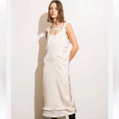 Brand New, Never Worn Size Small/Medium Color: Ivory Off White Sleeveless Midi Dress For Evening, Off White Sleeveless Evening Midi Dress, Beige Silk Midi Dress, Cream Midi Dress For Brunch, Chic Cream Sleeveless Dress, Chic Sleeveless Cream Dress, Chic Beige Knee-length Sleeveless Dress, Cream Midi Slip Dress For Evening, Chic Cream Silk Midi Dress