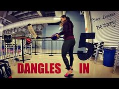 a woman standing in front of a sign that reads 5 dangeres in the gym