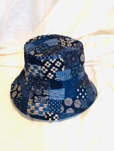 Japanese indigo patchwork bucket hat Reversible denim inside out Size: Small - 21" Medium - 22" Large - 23" Made from cotton and Japanese fabric from Japan. Each one is unique. Indigo Patchwork, Patchwork Hat, Patchwork Bucket Hat, Astoria Ny, Reversible Bucket Hat, Japanese Fabric, Sun Hats, Caps Hats, Bucket Hat