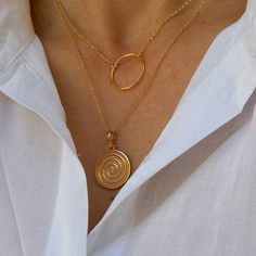 14k gold-filled floating necklace with an eye-catching Ancient Greek Spiral Pendant hanging on high quality 14k gold filled chain. Dainty everyday necklace. Ancient Greek Spiral is a symbol of infinity, of constant motion. Ideal gift! Complete the set: https://www.etsy.com/listing/1104147517/spiral-bracelet-bracelet-in-14k-gold?click_key=7ef248893cbaf975dd7625d86705068a8dbea0d2%3A1104147517&click_sum=afbaa32d&ref=shop_home_active_8&pro=1&frs=1 https://www.etsy.com/listing/1249712854/spiral-ring- Handmade Spiral Yellow Gold Jewelry, Gold Spiral Jewelry, Gold Spiral Necklace As A Gift, Gold Spiral Necklace For Gifts, Gold Spiral Necklace For Gift, Spiral Yellow Gold Necklace For Gift, Gold Plated Spiral Jewelry, Spiral Gold-plated Jewelry, Minimalist Gold Spiral Jewelry