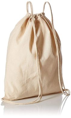 a white bag is sitting on the floor with no handles and drawstrings