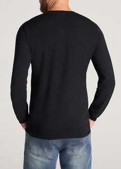 American Tall Men's Everyday V-Neck Sweater in Black. 60% Cotton, 40% Polyester. Refined, modern look. Long sleeve with ribbing at sleeve cuff. Ribbed shallow v-neck opening. More relaxed through the sleeves, chest, and waist for a traditional fit. Pre-washed to control shrinkage. Cut to your height and crafted to fit your build. Made for everyday, year-round comfort. MORE DETAILS:Designed to ensure that you stay warm, this Everyday V-Neck Sweater will never make you feel too warm. Who said you