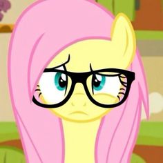 a pink pony with glasses on it's face and long hair, staring at the camera