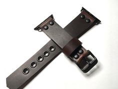 "This is my latest design of Horween Dark Brown Chromexcel leather strap. This Dark Blue leather strap is made from high quality full grain leather. The entire process is done by hand, no machines involved This band is designed for heavy duty use and sports, it has strong eyelets used to support the punch holes so it will be durable in years to come. The width and length vary. Please select the width of the strap and the length (wrist size) in the \"variations\" field. For any further customizat Handmade Adjustable Leather Watch Band, Handmade Adjustable Leather Watch Accessories, Adjustable Leather Watch Band In Black, Adjustable Black Leather Watch Band, Vintage Brown Adjustable Leather Strap Watch Band, Adjustable Vintage Brown Leather Watch Bands, Adjustable Leather Watch Bands With Black Band, Custom Brown Leather Watch Bands, Adjustable Brown Watch With Black Band