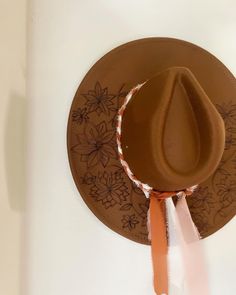 Let good luck blossom on your head with this unique, handburned wide-brim hat featuring sunflowers and luck. The caramel color brings out the vibrant design, making it an ideal accessory to bring a bit of charm to any boho outfit. ‘The Luckiest’ inscribed under the brim Rancher Hat, Boho Outfit, Boho Hat, Caramel Color, Wide Brimmed Hats, Brim Hat, Vibrant Design, Custom Hats, Wide Brimmed