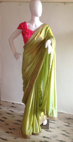 "Beautiful lime green semi silk saree with a buttery feel and soft sheen. The saree look totally out of the world paired with the gorgeous pink sequin blouse. You will absolutely glow in this wonderful saree. Its easy to wear too and pleats fall beautifully. Saree width :44\" Length :5.5 meters Blouse piece: 1 meter 44\" wide Shipping time is 4-5 days. Please don't hesistate to convo me if you have any questions" Light Green Saree Blouse Combination, Light Green Saree With Contrast Blouse, Lime Green Saree, Light Green Saree, Saree Outfit, Saree Pose, Green Butter, Green Sari, Bengali Culture